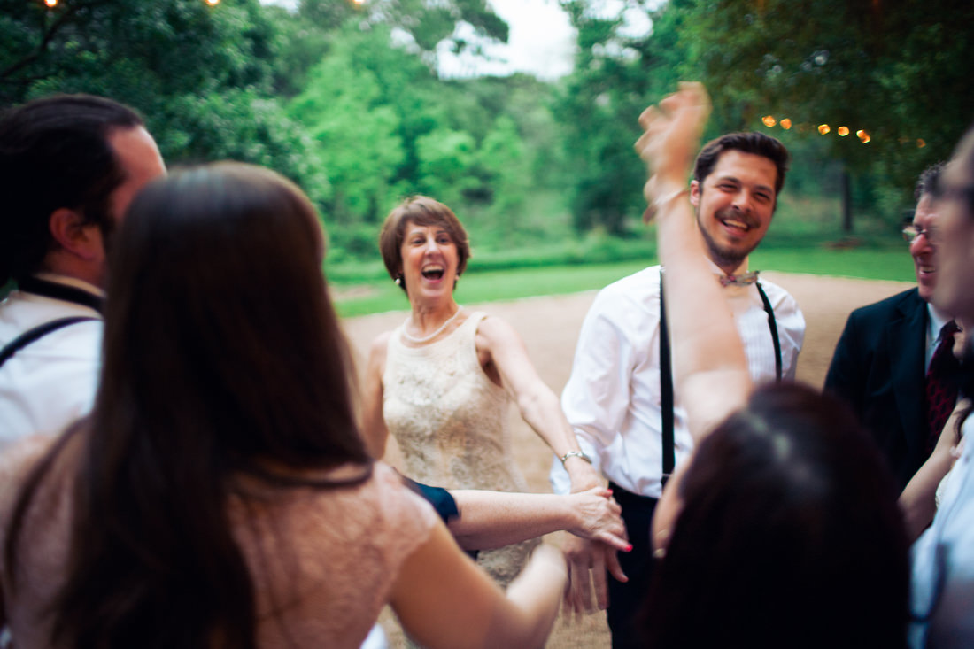 family dancing at wedding